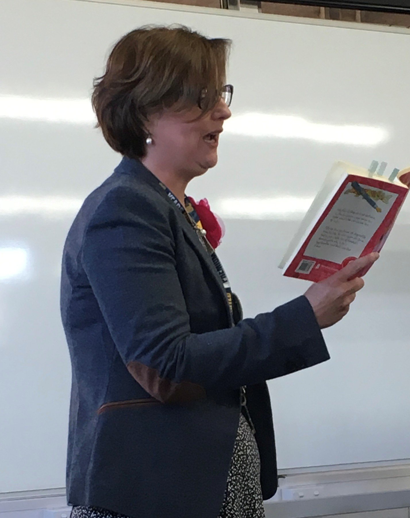 Paula reading aloud from one of her books